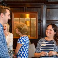 Three alumni gather and network